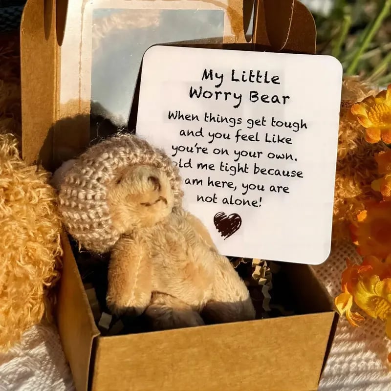Mini teddy bear arranged in its sweet gift box