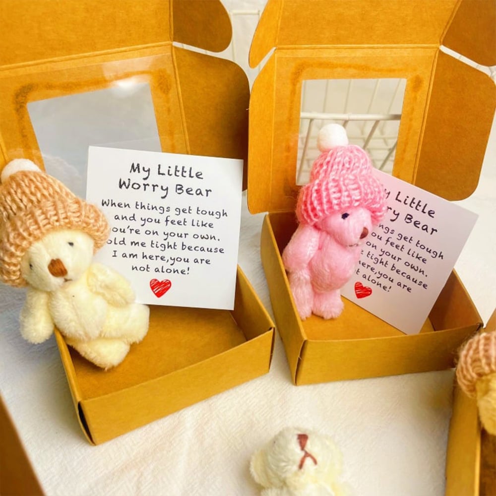 Mini teddy bear placed nearby as a comforting everyday companion