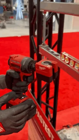 Impact driver threaded rod nut runner in use